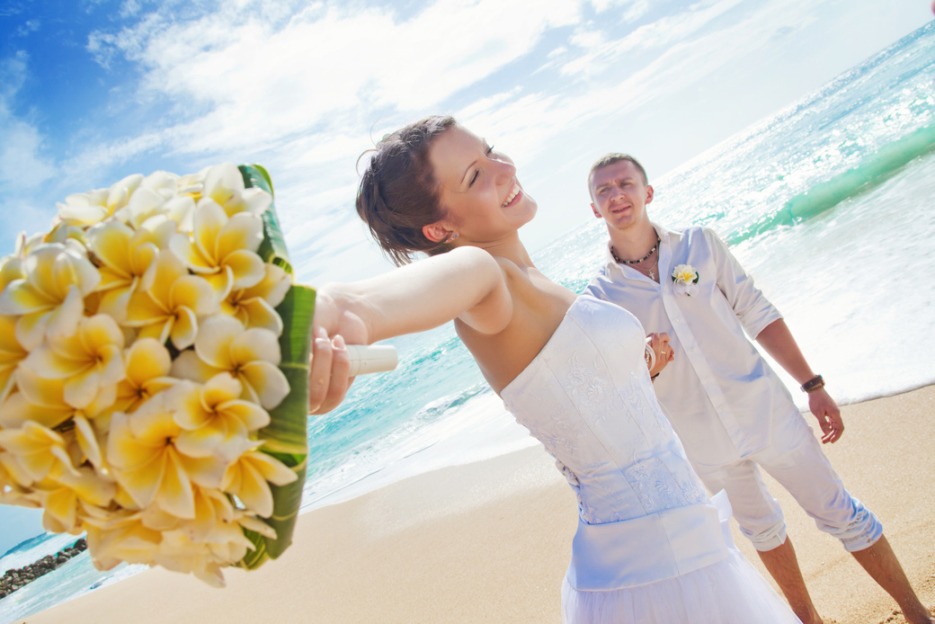 Bride and groom on the beach